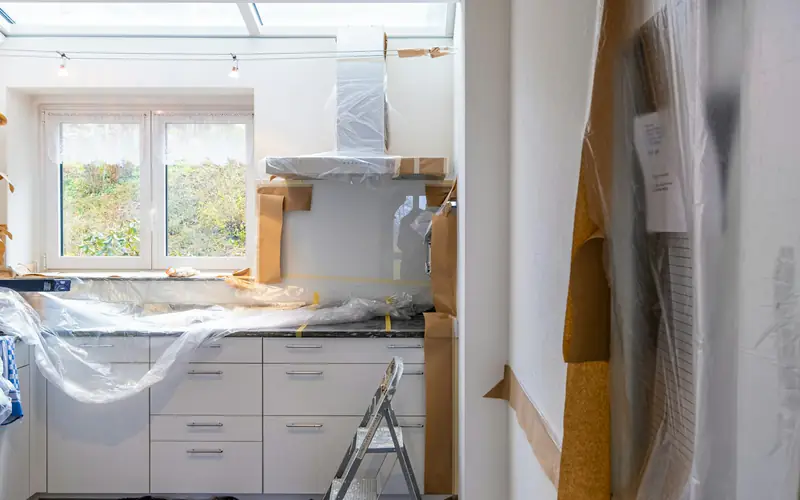 Newly renovated room being cleaned after construction work